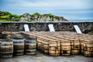 Whisky barrels by the sea